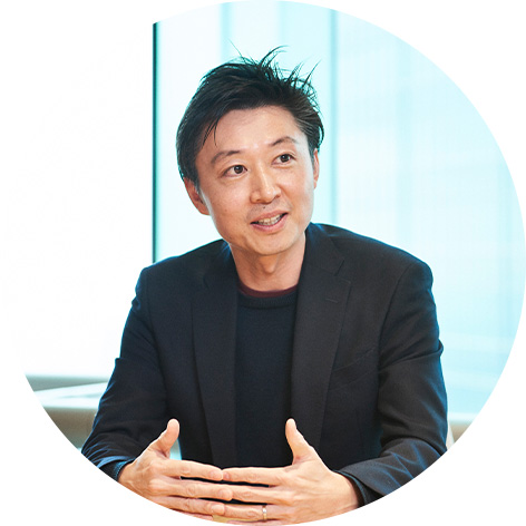 新谷 玄