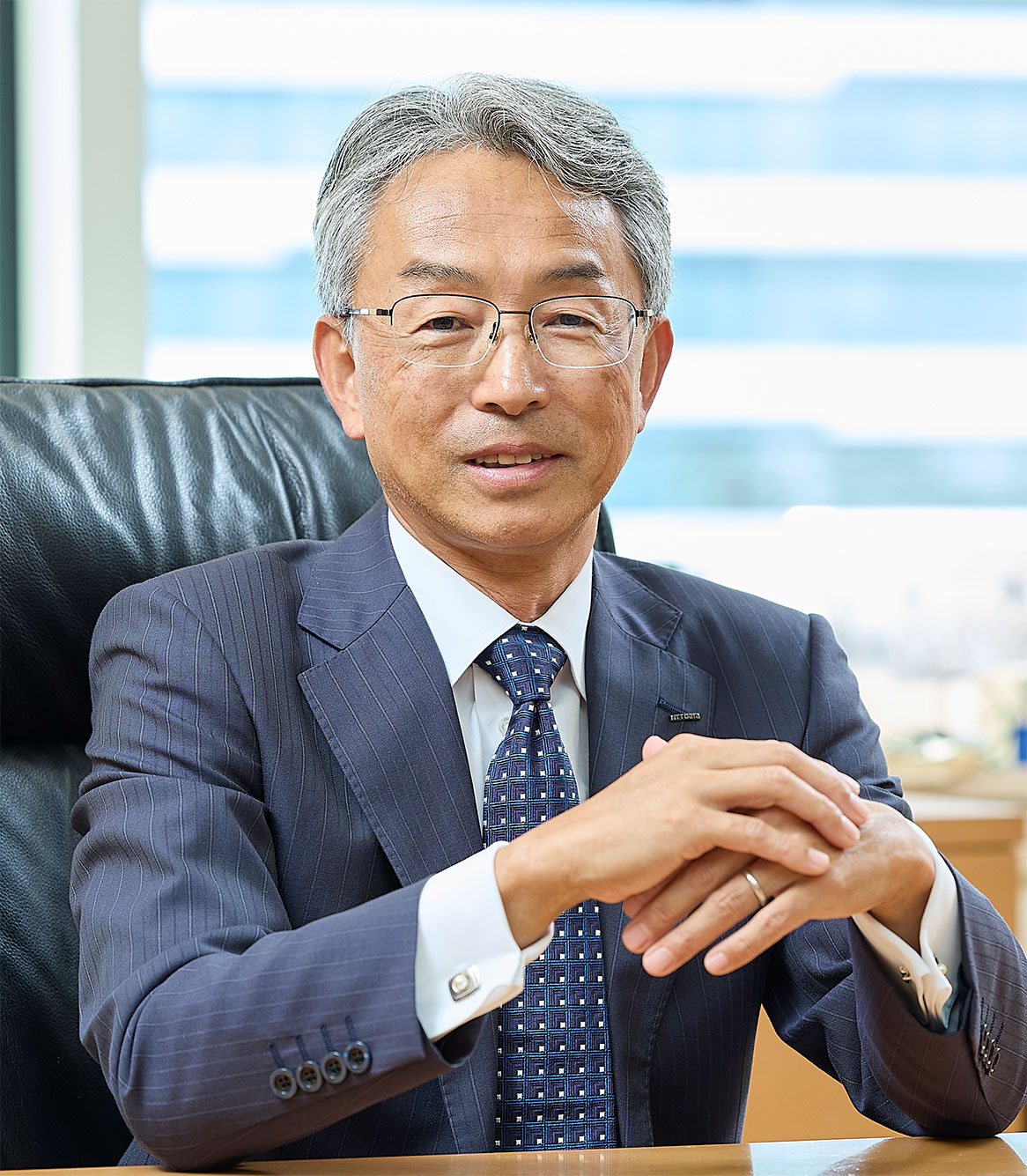 株式会社NTTデータグループ 代表取締役社長 佐々木裕